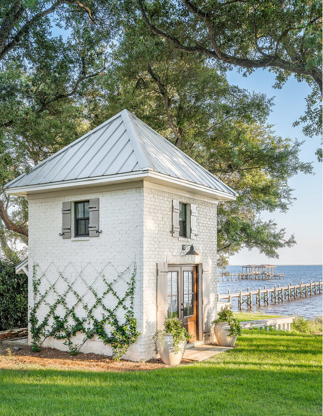 Modern farmhouse shed. Modern farmhouse shed with painted brick and metal roof exterior. Garderning shed #shed #modernfarmhouse #garderningshed #paintedbrick #modernfarmhouseshed #farmhouseshed #metalroof Dalrymple | Sallis Architecture