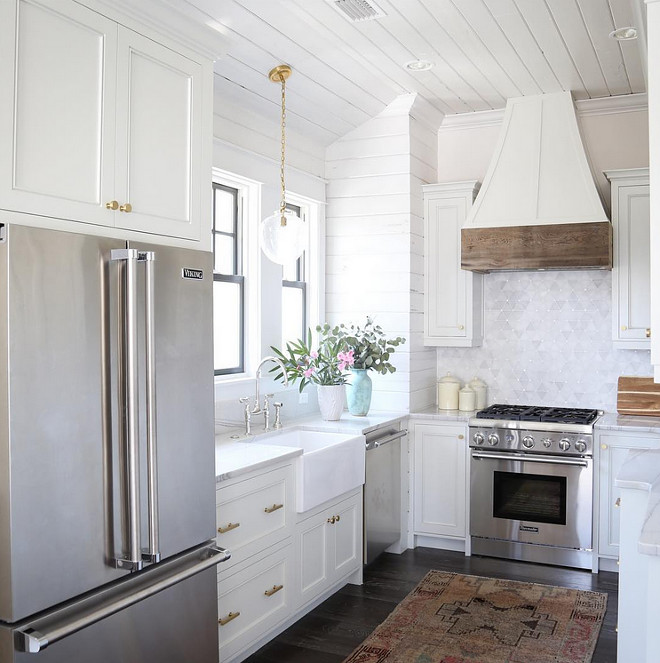 Small kitchen shiplap. Small kitchen with shiplap backsplash and shiplap ceiling. Lighting is Visual Comfort TOB5226HAB/G2-SG Thomas O'Brien Katie Acorn Pendant. Small kitchen with shaker cabinet doors, shiplap backsplash and shiplap ceiling. #smallkitchen #shiplap #kitchenshiplap #backsplashshiplap #shakercabinets #VisualComfort #TOB5226HAB/G2SG #ThomasOBrien #KatieAcornPendant oldseagrovehomes