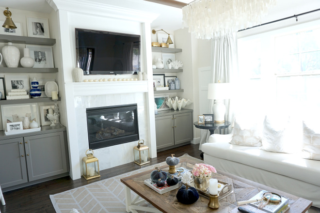 White living room with grey cabinets and bookshelves. White living room with grey cabinets and bookshelves. White living room with grey cabinets and bookshelves. White living room with grey cabinets and bookshelves #Whitelivingroom #greycabinets #bookshelves @myhouseoffour