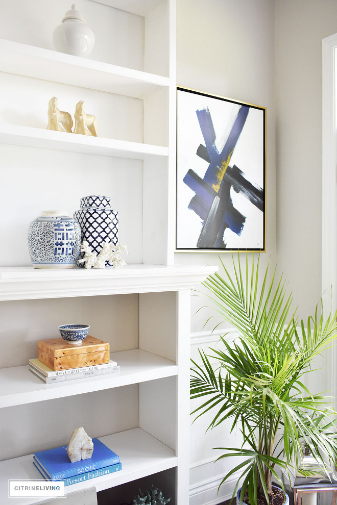 bookshelf-with-blue-and-white-accessories-design-books-agate-ginger-jars-coral-bookshelf-with-blue-and-white-accessories-design-books-agate-ginger-jars-coral-bookshelf-with-blue-and-white-accessories-design-books-agate-ginger-jars-coral #bookshelfwithblueandwhiteaccessories #designbooks #agate #gingerjars #coral Beautiful Homes of Instagram @citrineliving Home Bunch