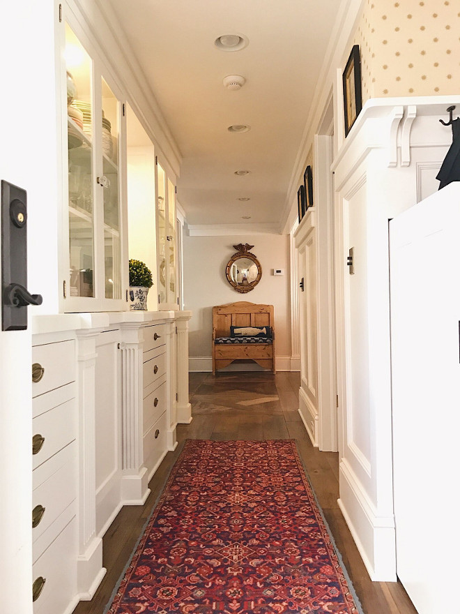 Butlers pantry. Classic Butlers pantry. Back pantry has a butler's vibe. Antique rug was a gift from a friend. Pine bench is an antique. Whale pillow from Homegoods. Mirror is antique from Mountain Dandy in Jackson Hole. Star wallpaper is Osborne & Little. #Butlerspantry Beautiful Homes of Instagram @SweetShadyLane