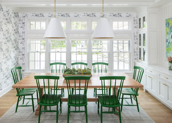 Dining room. Hamptons-inspired dining room. Dining room. Hamptons-inspired dining room with custom built-in cabinets, floor-to-ceiling windows, transoms and black and white floral wallpaper. Martha O’Hara Interiors