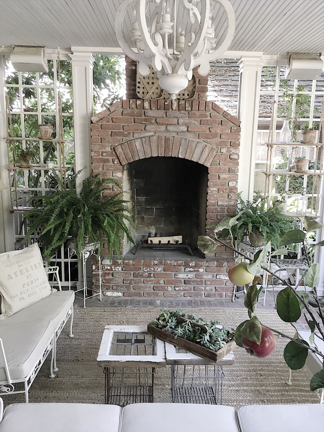 Farmhouse back porch brick fireplace and white and flea market decor. Farmhouse back porch brick fireplace and white and flea market decor. Fixer upper Farmhouse back porch brick fireplace and white and flea market decor #Farmhouse #backporch #brickfireplace #whitedecor #fleamarket #fixerupper Beautiful Homes of Instagram @my100yearoldhome
