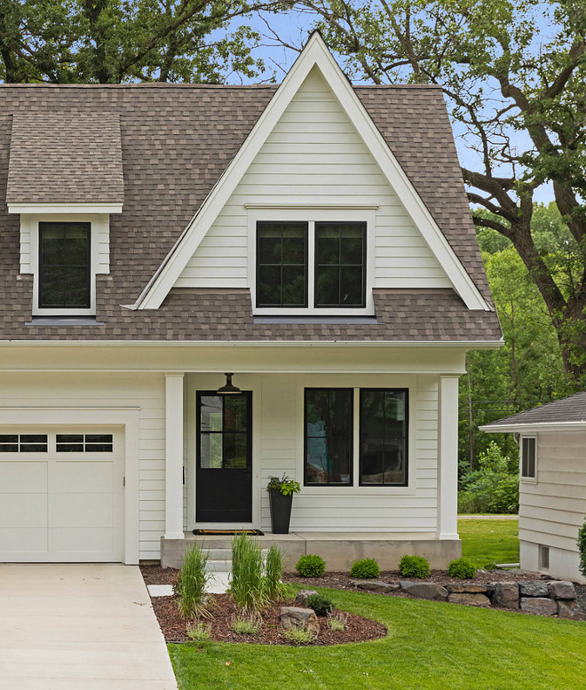 Farmhouse black window and Black Door paint Color. The front door is Benjamin Moore "Black". Farmhouse Farmhouse black window and Black Door paint Color #Farmhouse #blackwindowpaintcolor #BlackDoorpaintColor Refined LLC