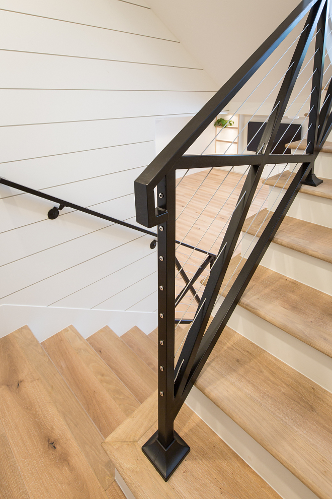 Farmhouse stair with black steel cross railing, steel cable, white oak threads and shiplap wall paneling. Farmhouse stair with black steel cross railing, steel cable, white oak threads and shiplap wall paneling. Farmhouse stair with black steel cross railing, steel cable, white oak threads and shiplap wall paneling. Farmhouse stair with black steel cross railing, steel cable, white oak threads and shiplap wall paneling. Farmhouse stair with black steel cross railing, steel cable, white oak threads and shiplap wall paneling #Farmhousestair #blacksteel #crossrailing #steelcable #whiteoakthreads #shiplap #paneling AK Construction