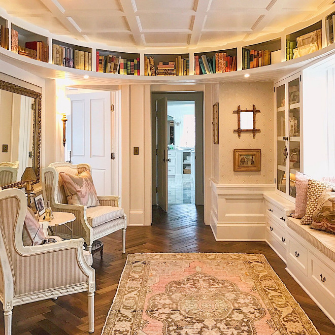 Landing with curved walls, curved bookcases, window seat, built-in cabinets, coffered ceiling and herringbone wood floors. Beautiful Homes of Instagram @SweetShadyLane