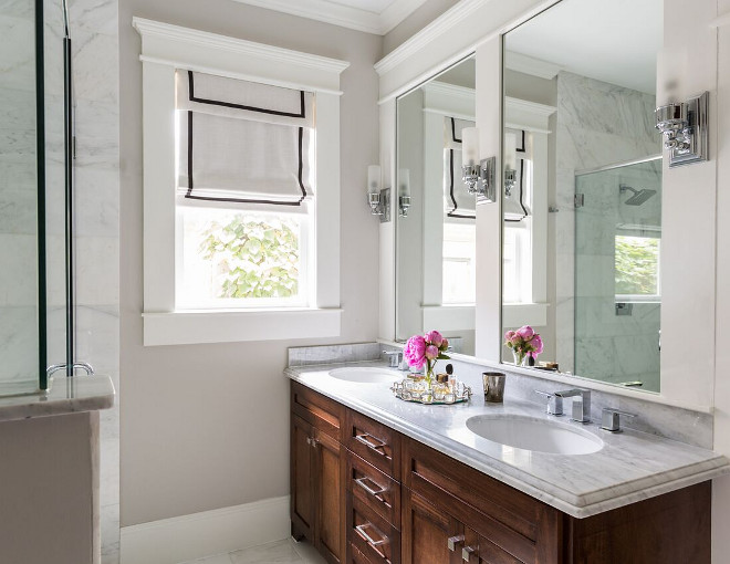 Master Bathroom. Master Bathroom. Master Bathroom. Master Bathroom. Master Bathroom. Focus on increasing natural light and functionality. Added a window by the sink area next to a large walk-in shower to increase the light the space receives and maximized square footage by incorporating various forms of storage. -Combined contemporary plumbing fixtures with craftsman-style woodwork to create a space that feels modern while remaining respectful to the home’s historic character. -Stained cabinets to add warmth to the clean white marble palette. #MasterBathroom Marie Flanigan Interiors