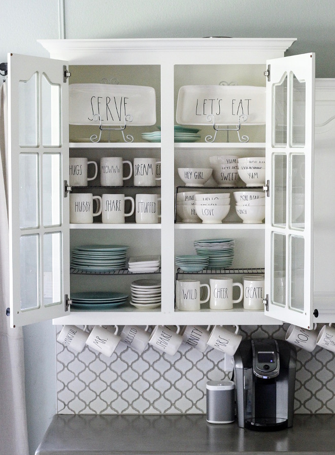 Mugs. Kitchen cabinet mug ideas. Collection of hard-to-find Rae Dunn dishware that she has collected over time, along with her collection of vintage LuRay dishes in soft blue/green. #mugs #kitchen #cabinet #mug Home Bunch Beautiful Homes of Instagram @cottonstem