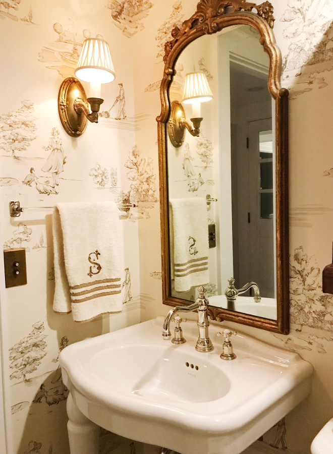 Powder room wallpaper and gilded mirror. Powder Room with antique mirror and sconce with the my favorite, Nina Campbell "promenade" wall covering. Sink and faucet by Kohler. Towel bar is antique. #powderroom #wallpaper #gildedmirror Beautiful Homes of Instagram @SweetShadyLane