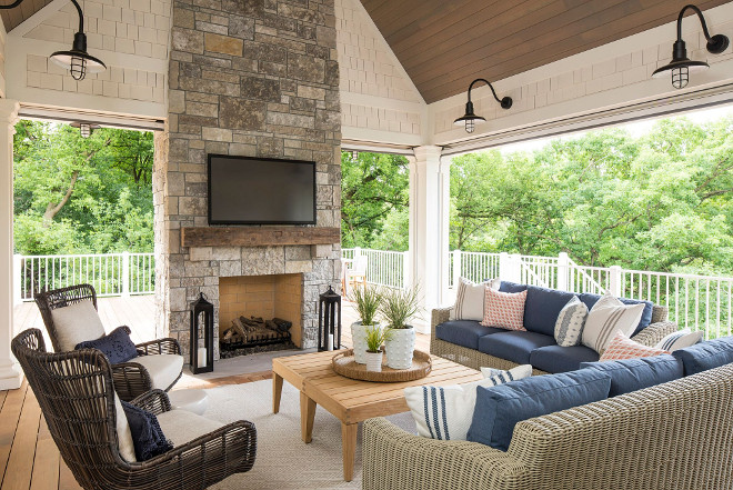 Screened porch with stone fireplace, vaulted ceiling and coastal farmhouse lighting. This screened porch features a stunning stone fireplace with timber mantel, a comfortable seating area, vaulted ceilings and coastal farmhouse lighting. Screened porch with stone fireplace, vaulted ceiling and coastal farmhouse lighting. Screened porch with stone fireplace, vaulted ceiling and coastal farmhouse lighting. Screened porch with stone fireplace, vaulted ceiling and coastal farmhouse lighting #Screenedporch #stonefireplace #vaultedceiling #coastalfarmhouse #lighting Martha O’Hara Interiors