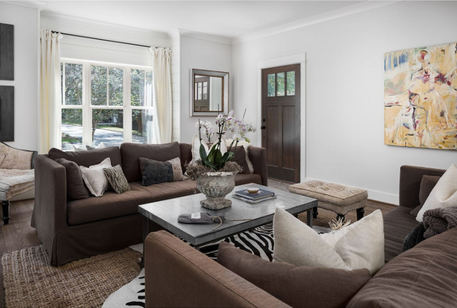 This living room features a very warm and welcoming color scheme and one of most popular paint colors by Benjamin Moore; White Dove on walls and Revere Pewter on trim. . Wall paint color is White Dove Benjamin Moore. Trim Color is Revere Pewter Benjamin Moore - the two most popular paint colors by Benjamin Moore. Willow Homes