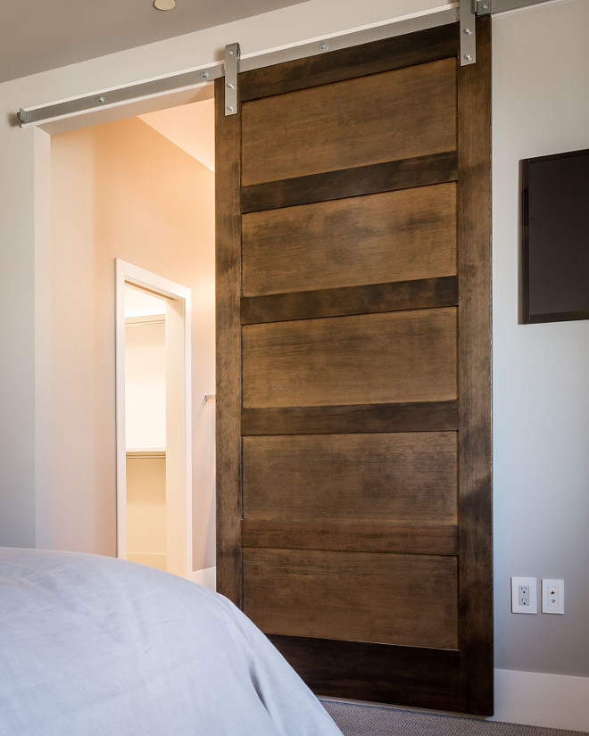 Bedroom Barn Door An Alder barn door conceals the master bedroom from the master bathroom #Bedroombarndoor #barndoor #Alderbarndoor