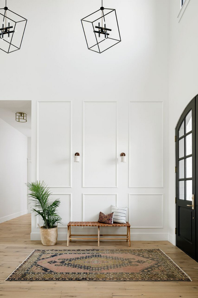 Foyer paneling. Foyer paneling.The entry of this gorgeous custom home is everything we could have asked for; simple, yet welcoming. The ceilings are 22 feet high with the drop down black light fixtures and a large double black entry door. Wood flooring throughout with wall trim and sconces. Foyer paneling. Foyer paneling. Foyer paneling. Foyer paneling. Foyer paneling. Foyer paneling #Foyerpaneling A Finer Touch Construction