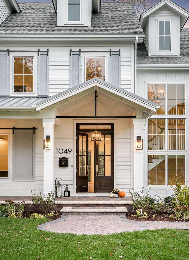 Front Door Portico Lighting Front Door Portico Lighting and shutters hung with barn door hardware #frontdoor #Portico #Lighting #shutters