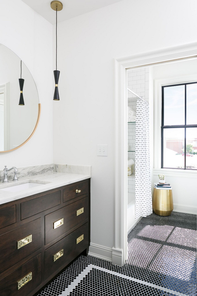 The floor tile is a black, 7/8” x 1” hexagon with a white 7/8” x 1” hexagon border. Both tiles are from American Universal Corp. The black tile is AUCSX-15 Shiny finis. The white tile is AUCSX12 Shiny finish #kidsbathroom #blackandwhitetile Ramage Company