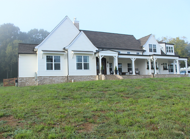 Newly Built Modern Farmhouse with white siding, metal roof and brick porch New Construction Newly Built Modern Farmhouse with white siding, metal roof and brick porch #NewlyBuilt #ModernFarmhouse #whitesiding #metalroof #brickporch Beautiful Homes of Instagram Home Bunch