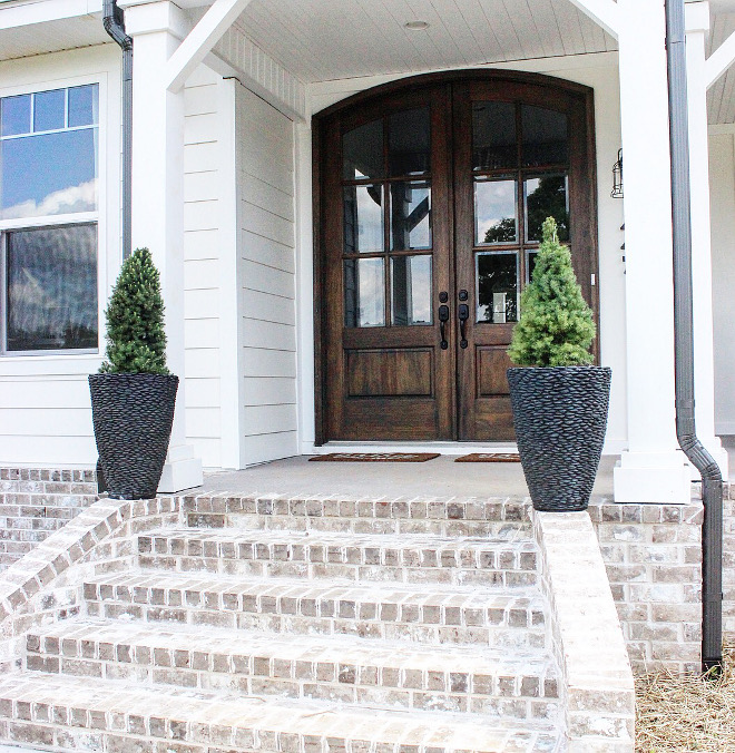 Whitewashed exterior brick. Modern farmhouse with Whitewashed exterior brick porch Magnolia Ridge" General Shale, Ivory Mortar #Whitewashedexteriorbrick #Whitewashedbrick