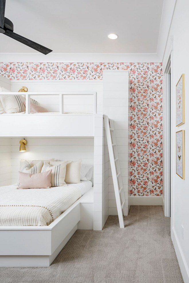 Bunk room. The bunk beds are wrapped in shiplap and then topped off with gold sconces. Each of the sconces can be controlled individually for night time reading. I think we may need to build one at my house next. #bunkroom #bunkbeds #shiplap A Finer Touch Construction