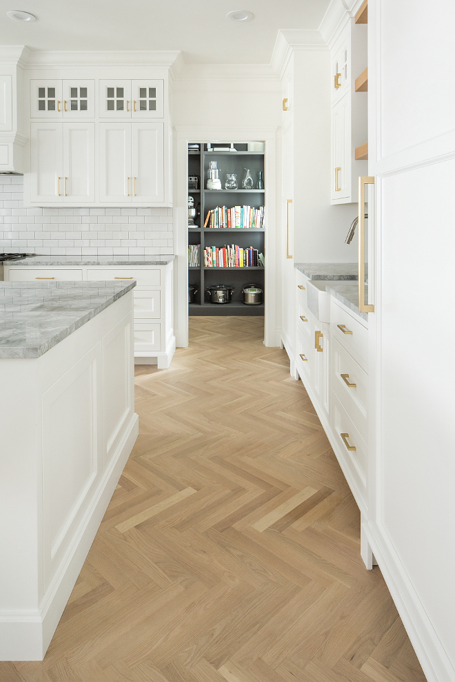 Herringbone Kitchen Flooring Herringbone hardwood kitchen flooring The flooring in the home is white oak select grade in a natural matte Bona finish Most of the main floor we did in a herringbone pattern with 2 1/4 inch plank #HerringboneKitchenFlooring #Herringbonehardwoodflooring