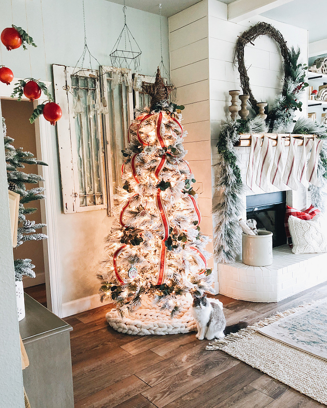 chunky cable knit Christmas tree skirt This Christmas tree features a chunky cable knit Christmas tree skirt