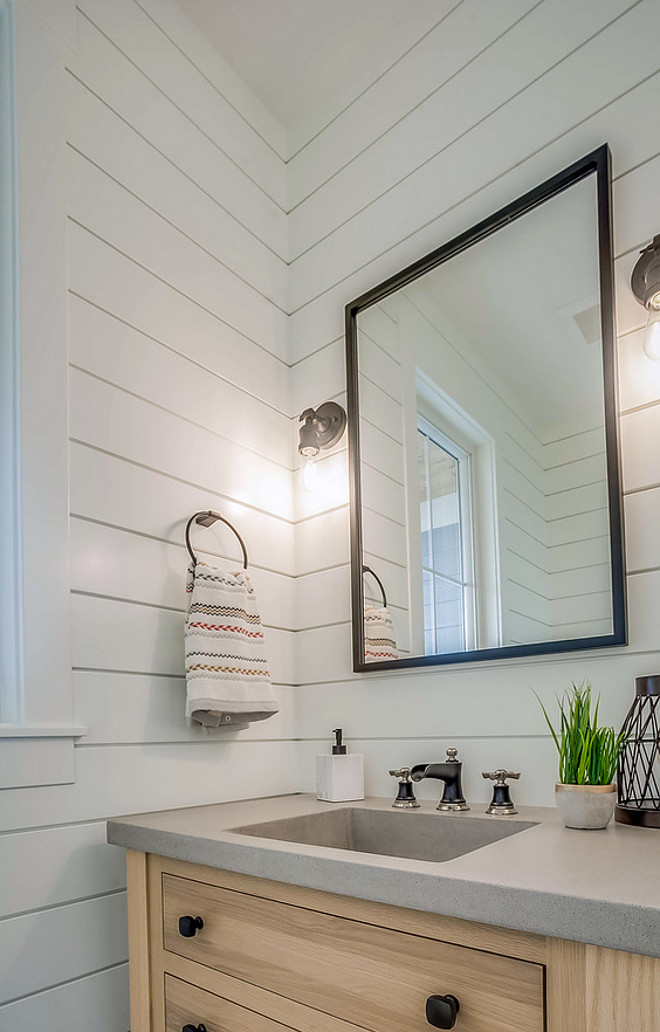 Farmhouse Bathroom Farmhouse bathroom shiplap paneling white oak vanity concrete countertop with integrated sink metal mirror #farmhousebathroom