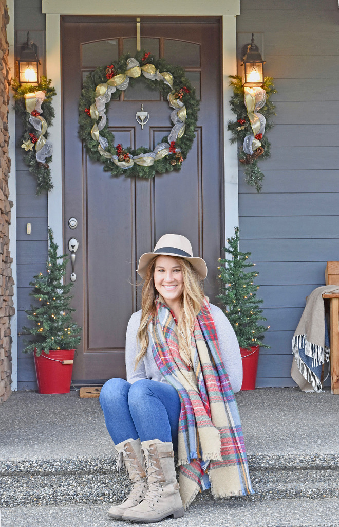 I knew when building our home that I wanted a large porch and I just love the mix of wood and stone in our entryway as well as the oversized 9 foot door that was custom made for our home Home Bunch's Beautiful Homes of Instagram