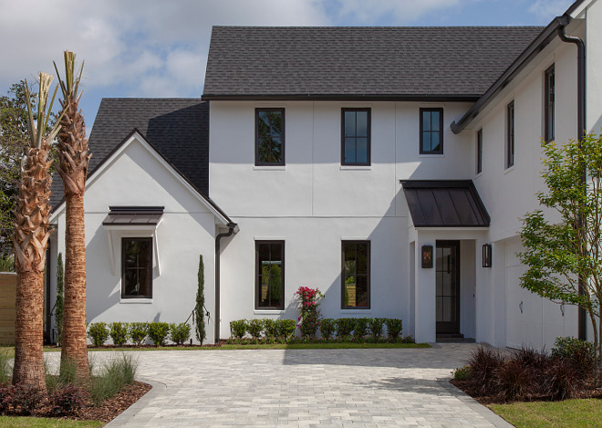 Modern Farmhouse with white stucco, black windows and black roof Modern Farmhouse with white stucco, black windows and black roof #ModernFarmhouse #white stucco #blackwindows #blackroof Home Bunch