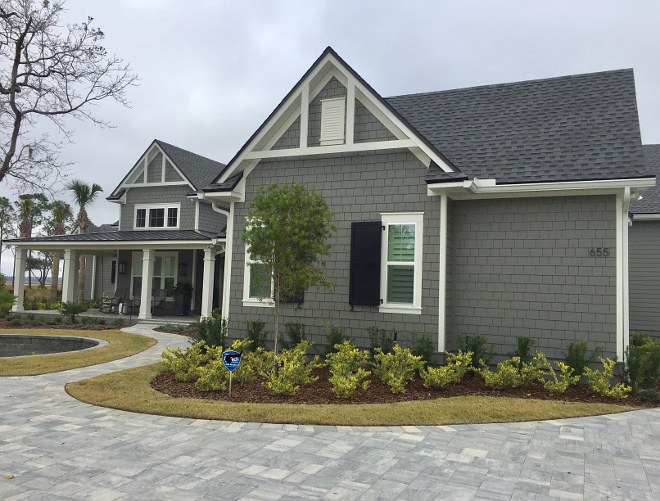 Siding is Chelsea Gray by Benjamin Moore and trim is White Dove by Benjamin Moore