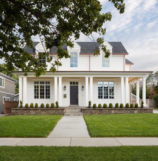 White Farmhouse Exterior Siding The exterior of the home is done is Artisan Hardie Boards in an 8 inch width plank White Farmhouse Exterior Siding #WhiteFarmhouse #Exterior #Siding