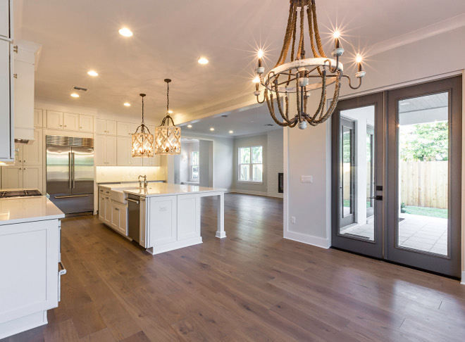 Breakfast Room The kitchen opens to a large breakfast nook with grey doors, painted in Benjamin Moore Kendall Charcoal HC-166