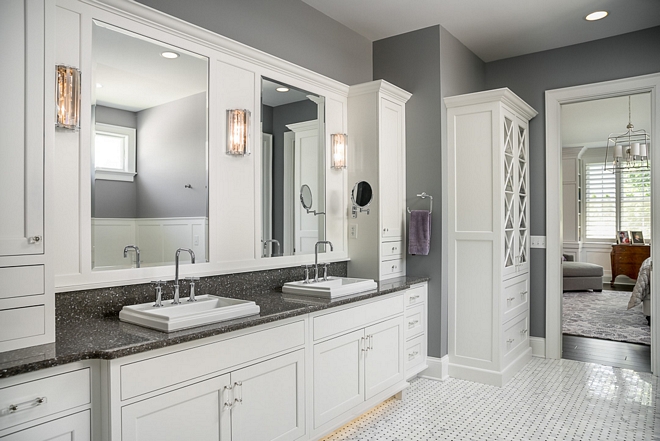 Double vanity The master bathroom features a large custom cabinet and plenty of storage