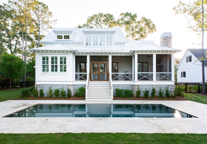 Modern Farmhouse with x deck railing and x fence The fence design above is similar to 5′ cross buck ranch design with 4×4 posts