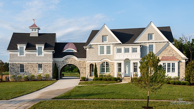 Stone and shingle home exterior Stone and shingle home exterior with copper accents Stone and shingle home exterior