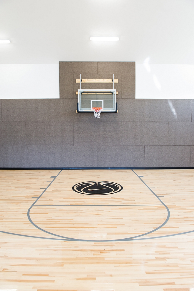 Basket court wall protection The walls are carpeted to not only protect from damage but to also help with sound