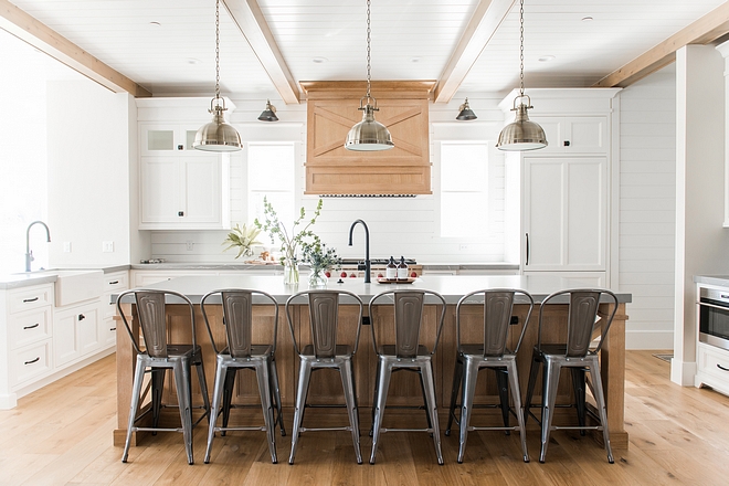 White kitchen with White Oak Hood and white oak kitchen island I love the combination of white cabinetry with White Oak - it's crisp without being cold