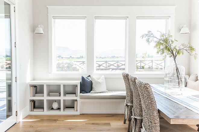 Breakfast room window seat This sun-bathed breakfast room is perfect for family life Notice the long window-seat with cubbies