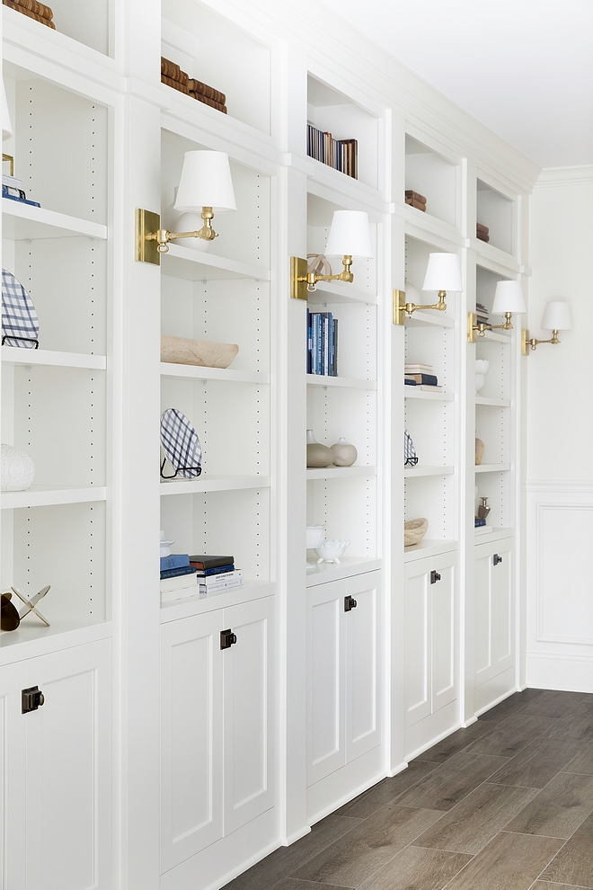 Hallway Bookcases with brass sconces Hallway Bookcase