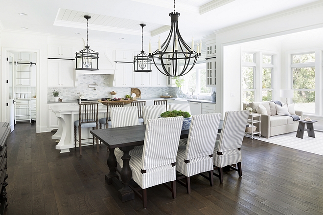 The kitchen and dining area opens to a sunroom