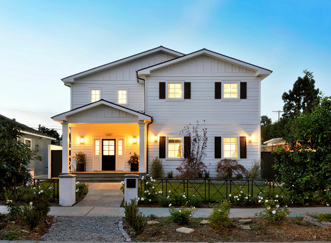 Modern Farmhouse with black door and black shutters