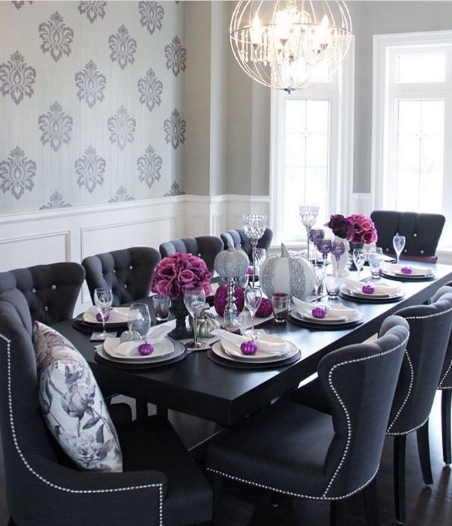 Dark stained dining table with navy blue chairs