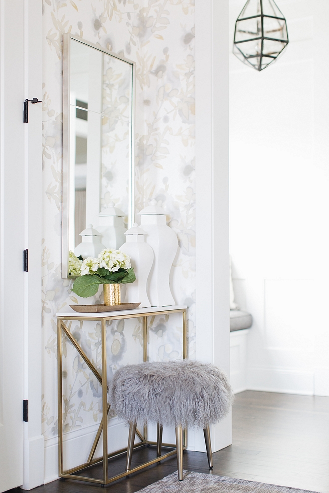 Foyer Decor Neutral Foyer Decor Ideas Brass console table and Grey Mongolian Lamb Stool Foyer Decor