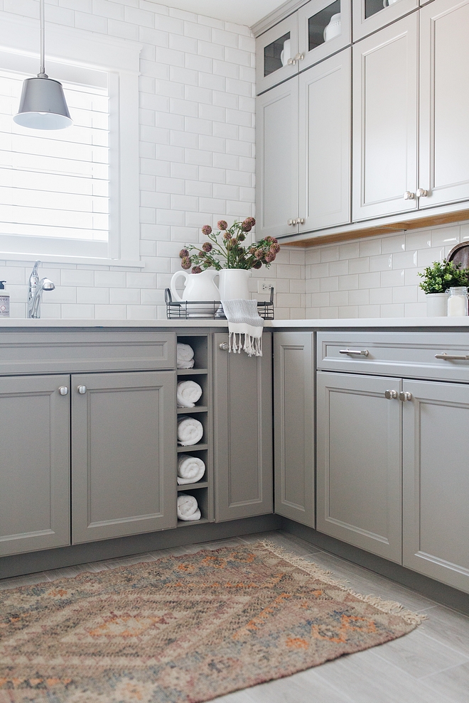 Laundry room Backsplash is beveled subway tile