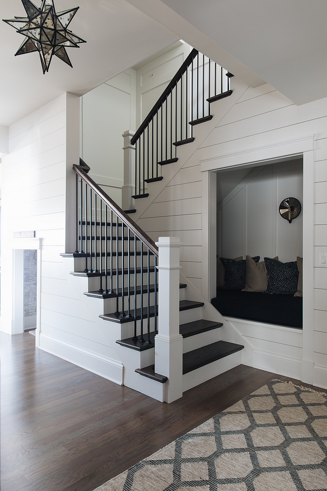 Reading Nook under stairs A staircase with shiplap leads to the basement Notice the reading nook under the staircase Under stairs nook Under stair reading nook Under stair reading nook plan
