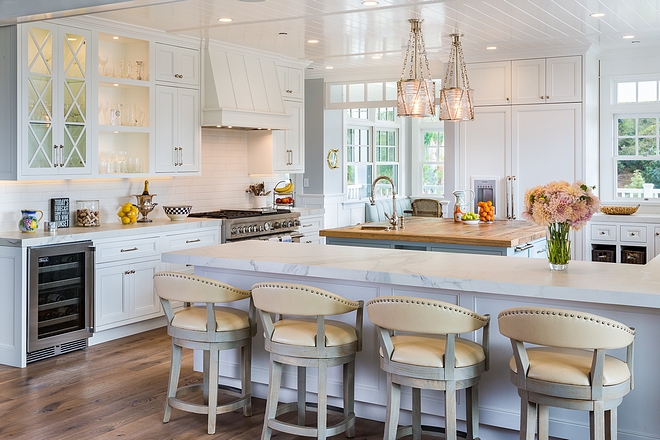 White Kitchen Classic White Coastal Kitchen with white cabinets and V-Groove ceiling and white trim White Kitchen Coastal White Kitchen