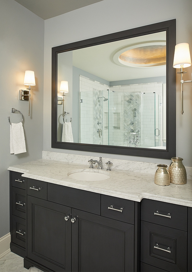 Benjamin Moore Mysterious Bathroom Vanity and mirror frame are painted in Benjamin Moore Mysterious #BenjaminMooreMysterious #bathroom #vanity #mirrorframe #paintcolor