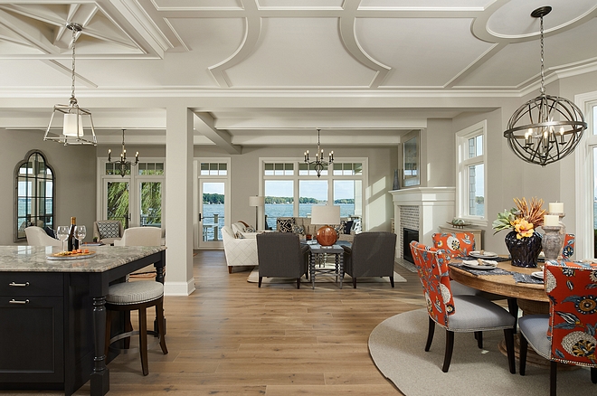Open floor plan Lakehouse Expansive windows, luxury finishes and a leisurely flowing design plan, optimizes views, sun exposure and circulation between indoor and outdoor spaces #lakehouse #openfloorplan