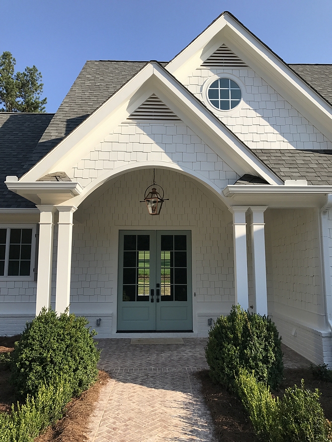 Can you guess the paint color used on this blue-green front door You're right if you guessed Wythe Blue HC-143 Benjamin Moore Wythe Blue HC-143 Benjamin Moore is my favorite color for front doors and I often recommend it to my own clients