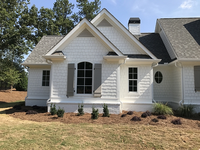 Shingle and brick are painted in Alabaster Sherwin Williams Exterior paint colors