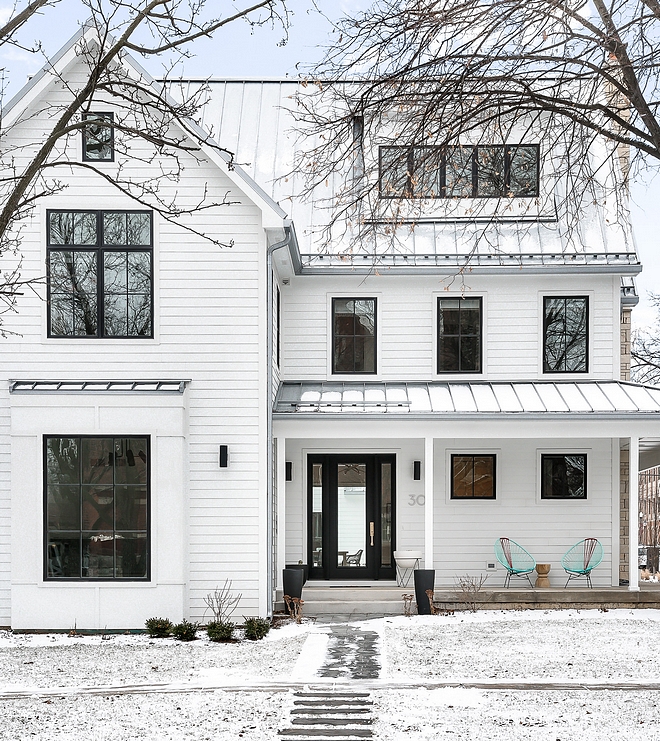 Exterior features James Hardie Arctic White which is by far the most popular white siding used on modern farmhouses