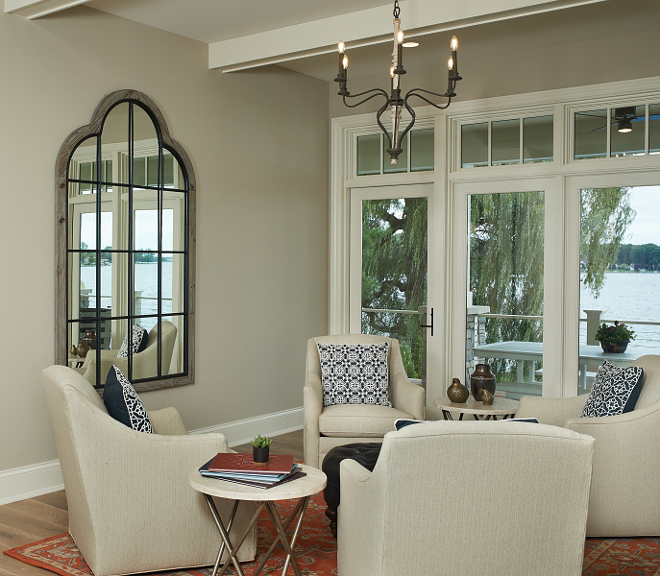 Conversation Area with Club Chairs on a circle chairs and mirror source on Home Bunch